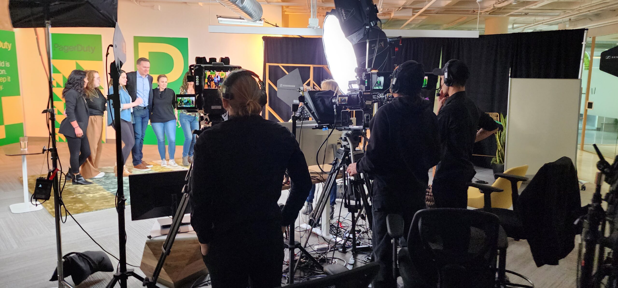 Argus HD multi-camera production crew filming PagerDuty on Tour broadcast with Sennheiser audio and professional lighting at Chase Center San Francisco