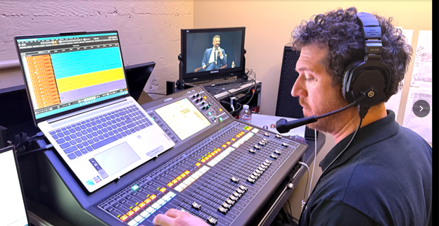 Argus HD audio engineer mixing the livestream feed on a Yamaha QL5 during The Ezra Klein Show live forum for The New York Times.